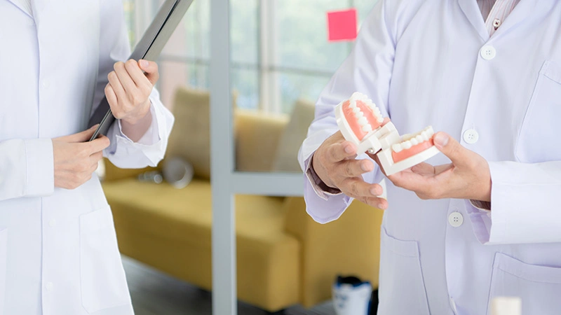 How Dentists Decide Between Veneers and Crowns